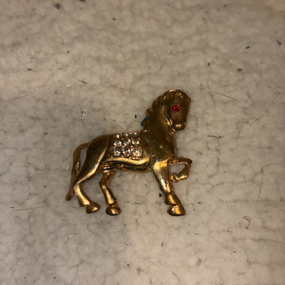 Gold Horse Brooch with Red Gem Eye
